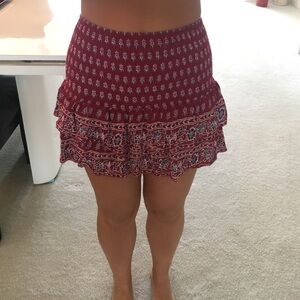 Adorable, maroon printed, smocked and ruffle skirt